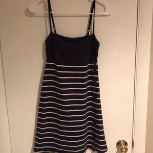 Navy blue dress with white stripes.